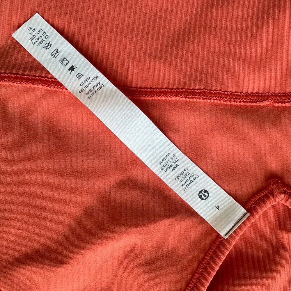 Lululemon coral colored deep V crop top